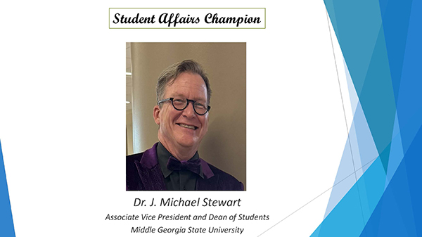 Image slide featuring the same info as description and a headshot of Dr. Michael Stewart